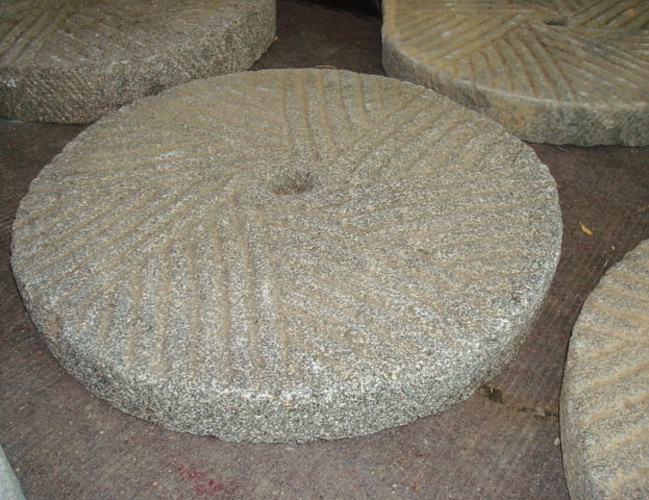 MILLSTONES, ANTIQUE CARVED STONE 18-21 INCHES