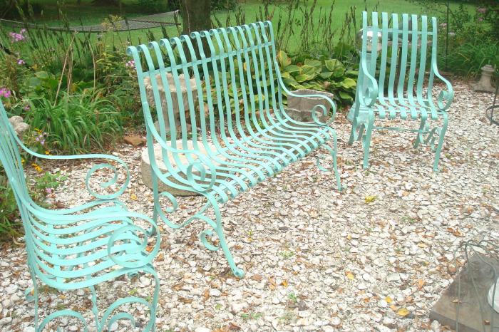 6 PIECE SET OF WROUGHT STEEL GARDEN BENCHES AND CHAIRS, 19TH C.