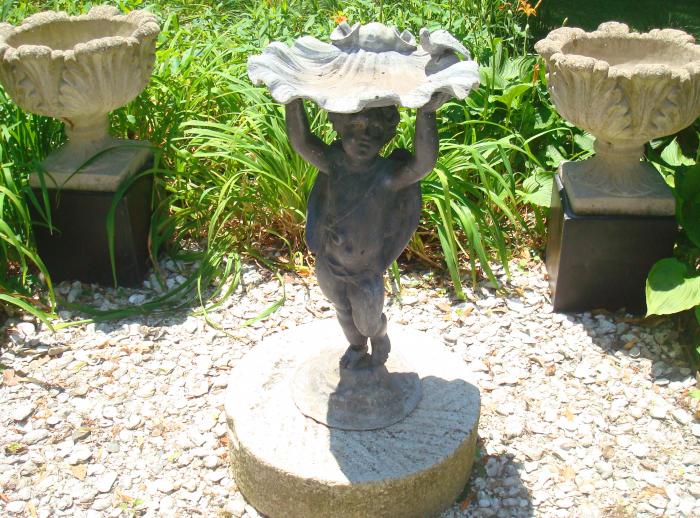 LEAD BIRD BATH OF PUTTO OR CUPID HOLDING SHELL