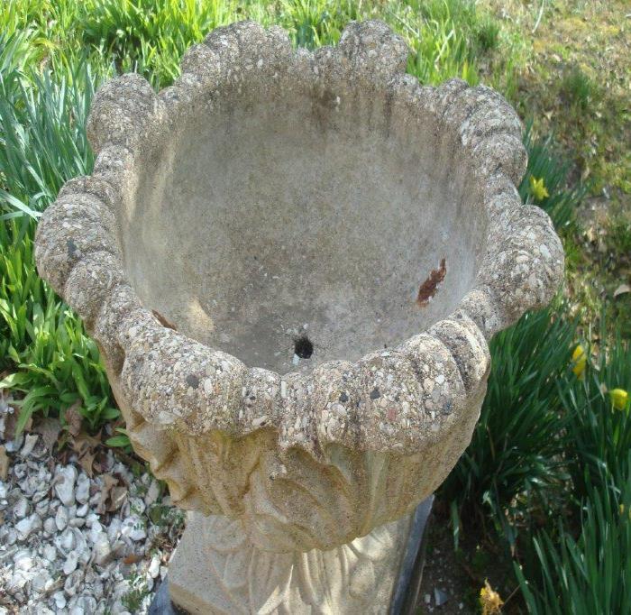 PAIR CAST STONE URNS WITH LARGE LEAVES